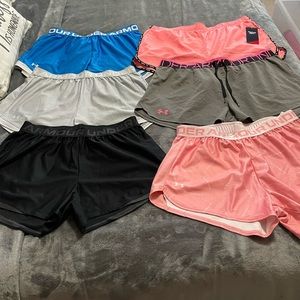 Under armour and Reebok shorts.